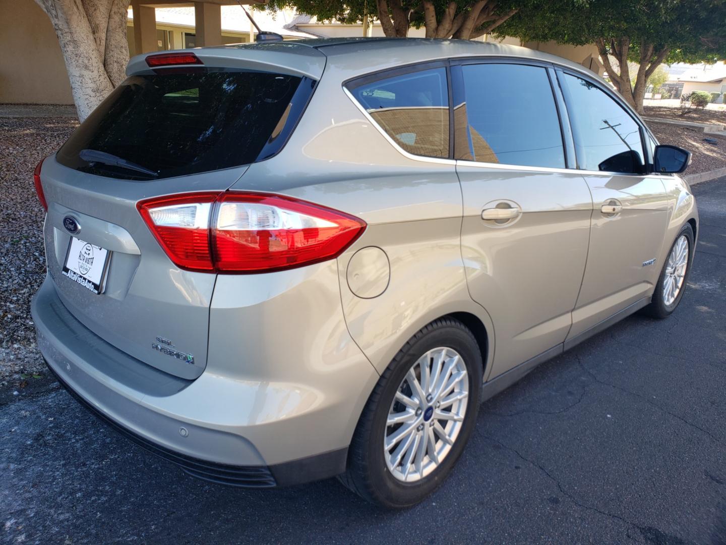 2015 /gray and black Ford C-Max Hybrid sel (1FADP5BU3FL) with an 2.0L L4 DOHC 16V engine, 6-Speed Automatic transmission, located at 323 E Dunlap Ave., Phoenix, AZ, 85020, (602) 331-9000, 33.567677, -112.069000 - 2015 Ford C-Max SEL,.......A Must See!!...... No accidents, Ice cold AC. The car is gorgeous inside and out. Power windows, Power door locks, Touch screen Stereo/Cd player, Phone sync, Bluetooth, Satellite compatible, Backup camera, Beautiful gray and black interior with black Leather seats, Incredi - Photo#3